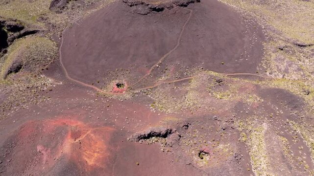 France, R&eacute;union Island, Puys Ramond Craters. Aerial view of volcanic formations. flyng over crater.
