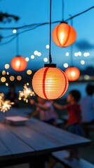 Hanging Lanterns Illuminate a Festive Evening by the Water