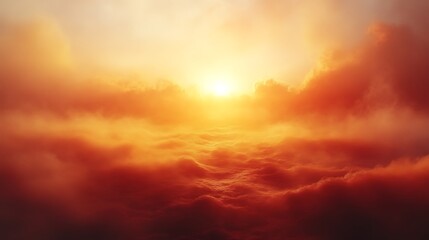 Fototapeta premium Fiery sunset above a sea of clouds.