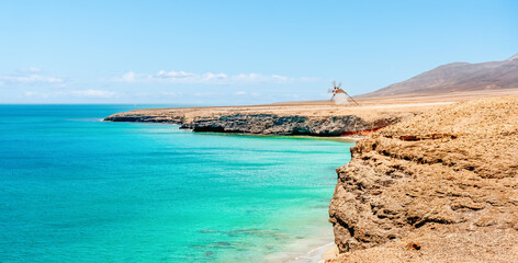 landscape of a desert paradise beach with turquoise water at Fuerteventura, Canary Islands, Spain - Summer background
