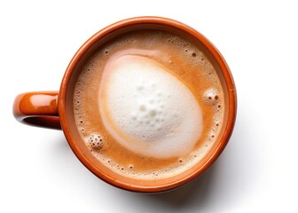 Aerial shot of a frothy milk-filled ceramic mug.