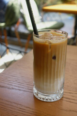 Enjoy a Refreshing Iced Coffee, complete with Ice Cubes in a Clear Glass for your delight