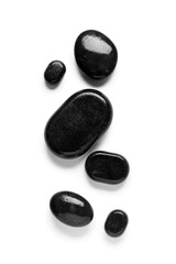 Composition with wet spa stones isolated on white background