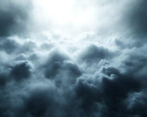 Bright light above dark, dense clouds.