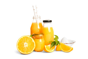 Bottles of fresh orange juice with mint and juicer on white background