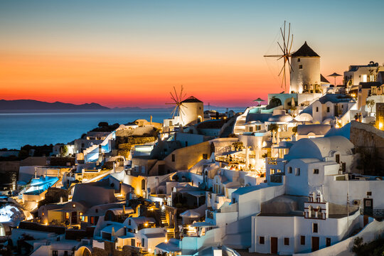 Romantic sunset over Oia, Santorini, Greece