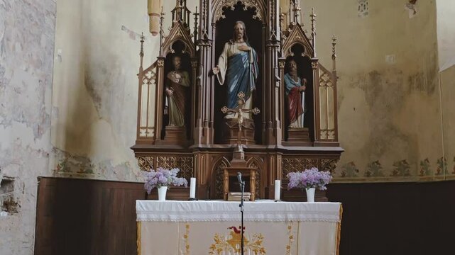 A detailed view of the altar inside Codlea's fortified church, showcasing intricate religious art, wooden carvings, and the serene ambiance of this historic space.