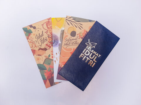 Amplop THR or Angpao or Envelopes filled with money to be given to children or family or relations during Eid al-Fitr. Money packets for Eid celebration