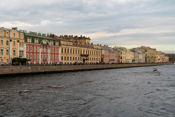 Fototapeta premium Historical buildings on the Fontanka River embankment: Kochubey's mansion, the houses of the Olsufievs, Golitsyn, Gromov and Bezobrazov on a summer day, Saint Petersburg, Russia