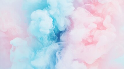 Fototapeta premium A vibrant swirl of pink and blue ink mixes in water, forming soft, billowy clouds that create a captivating visual effect in clear fluid