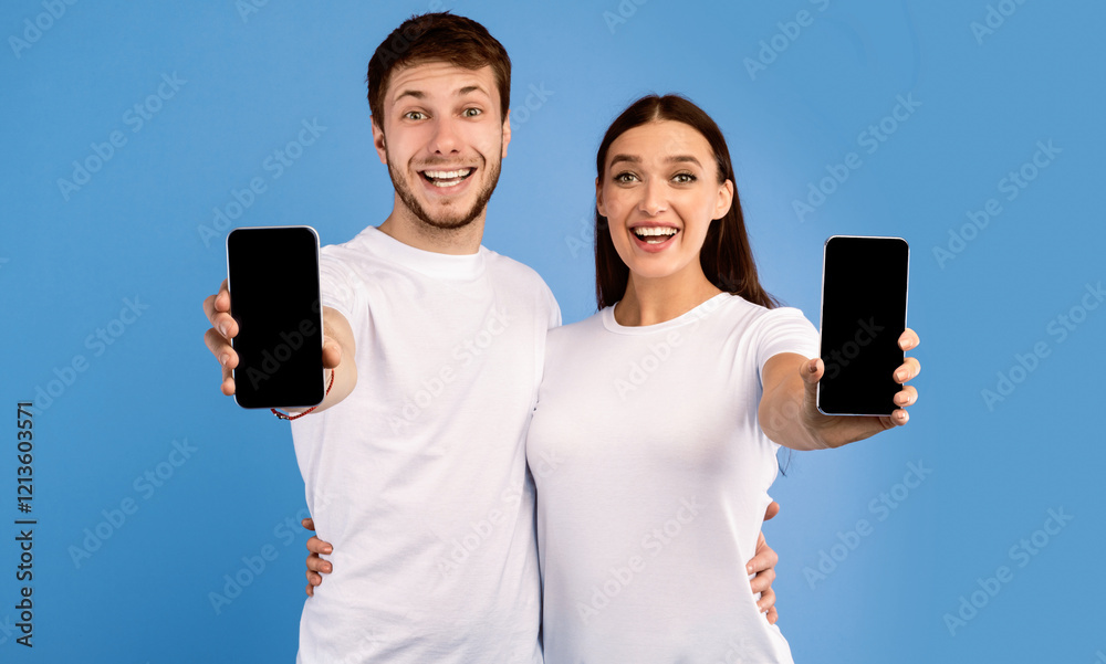 Poster useful application or website. excited couple showing black blank cellphone screen, empty space, moc