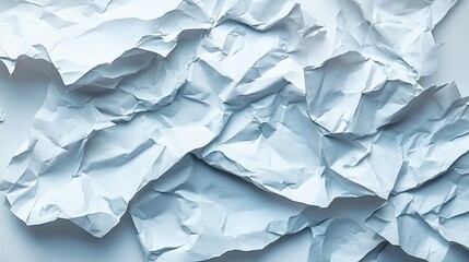 Fototapeta premium Crumpled white paper texture creating a visually interesting backdrop.