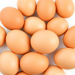 Brown eggs isolated on the white background
