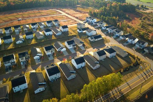 Aerial view of tightly packed homes in South Carolina residential area. New family houses as example of real estate development in american suburbs