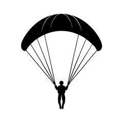silhouette of a paraglider