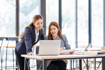 Two Business Documents, Auditor businesswoman checking searching document legal prepare paperwork or report for analysis TAX time,accountant Documents data contract partner deal in workplace office	
