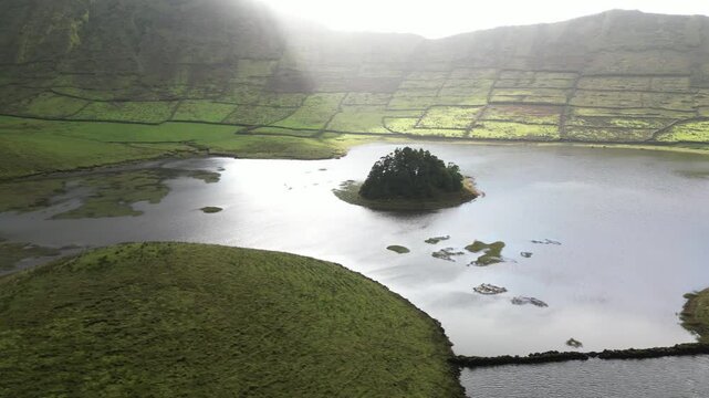 Azores, amazing Corvo island, in the middle of the Atlantic Ocean, green Corvo crater with the beautiful lake of Lagoa do Cachimbo.