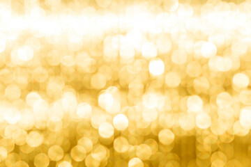 Obraz premium Abstract blurred yellow light bokeh background, festive season concept background, yellow bokeh pattern background