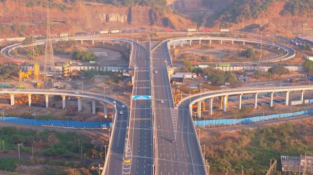 Drone shots cloverleaf junction links various roads