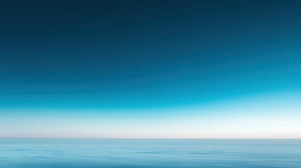 Obraz premium A stunning photo of a bright blue sky with no clouds, featuring the sun's intense light and a smooth gradient of vibrant blues.
