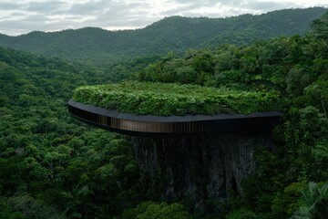 Futuristic building on a cliff overlooking lush green forest