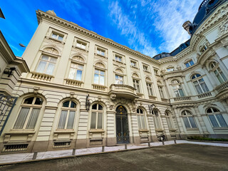 Imposing white government building with columns and a grand entrance