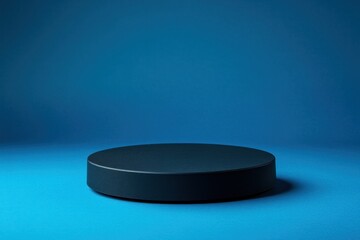 Dark circular platform on blue background. (1)