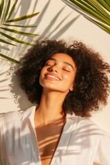 Fototapeta premium Candid moment of a young woman embracing her natural beauty under sunlight surrounded by lush greenery