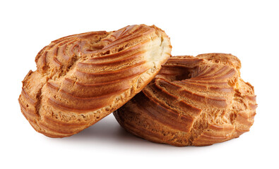 Two eclairs isolated on white background . Profiterole cake on white background . Eclair in the form of a ring .