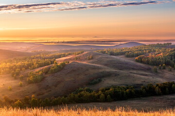 Magnificent landscape of the Karamuruntau ridge in the rays of the setting sun