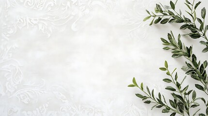 Green leaves on a white textured background