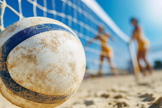 People playing beach volleyball.
