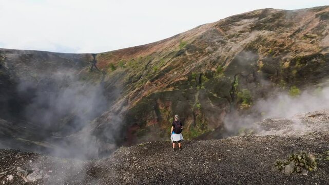 Hikers exploring the steaming crater of Paricutin Volcano in Michoac&aacute;n, Mexico