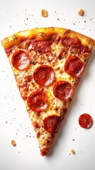 Pepperoni pizza slice on white backdrop with scattered seasoning and crust pieces overhead view