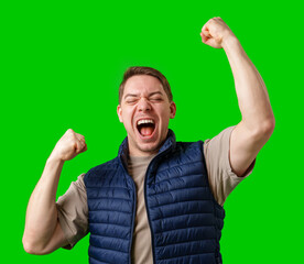 Man celebrating with raised fists in front of a bright green background
