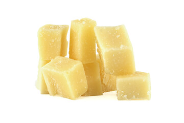 Parmesan cheese cubes forming a pile on white background