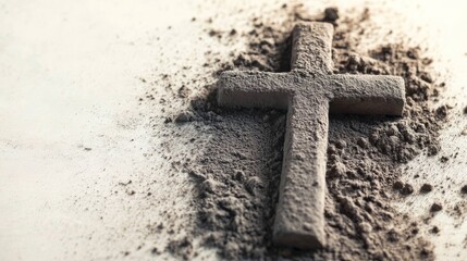 Cross is partially covered in sand