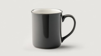 Fototapeta premium A smooth grey coffee mug with a modern cylindrical shape and a small handle, isolated on a white background 