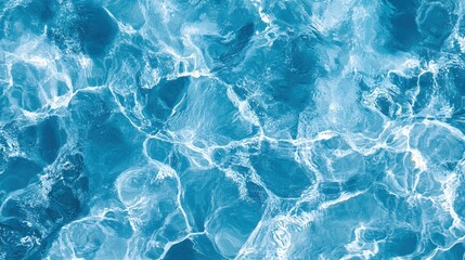 Obraz premium Abstract blue water surface with bright light reflections creating a calming and relaxing view