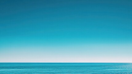 Fototapeta premium A crisp and vivid photo of a cloudless blue sky, with the sun's bright rays illuminating the scene with natural brilliance.