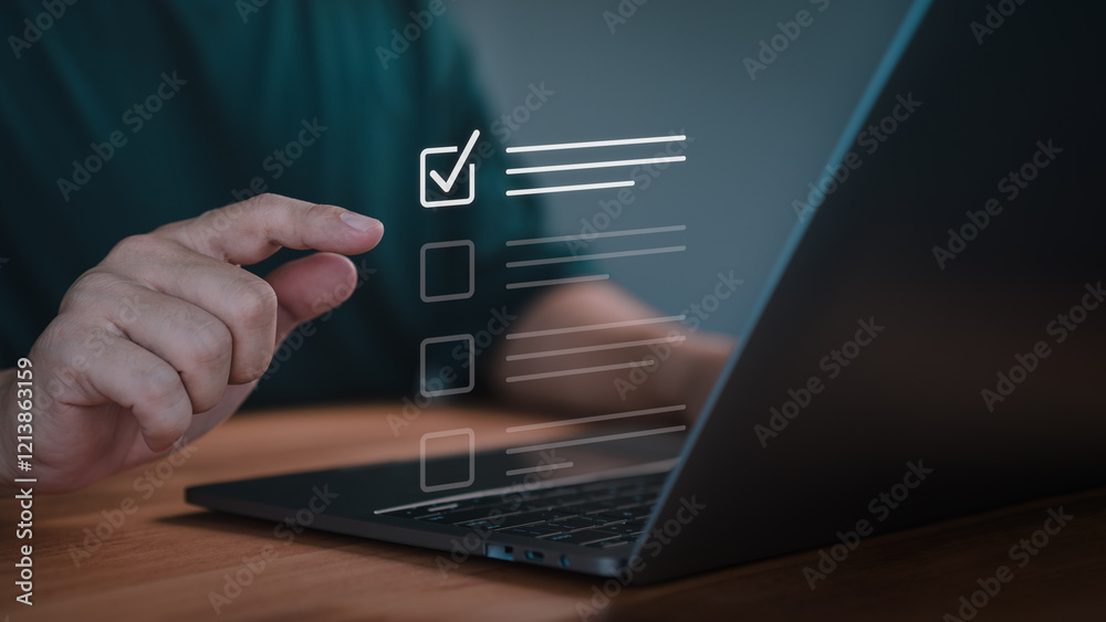 Fototapete Hand pointing at a virtual checklist with complete task on a laptop, symbolizing task management, customer service, quality control, productivity and efficient work processes in a digital environment.