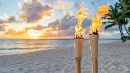 Tiki torches burning at sunset beach in hawaii closeup shot