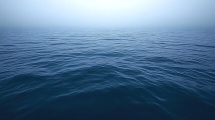 Obraz premium Serene Ocean Water Under a Misty Sky