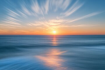 Ocean sunset, long exposure, dramatic sky, peaceful waves, coastal serenity