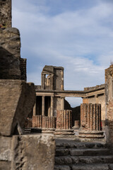 Naklejka premium View of ancient Roman city ruins street of Pompei, destroyed from eruption of Mount Vesuvius in 1st century.