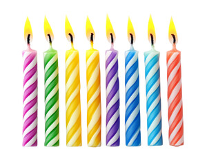 Colorful candles arranged for a birthday celebration.