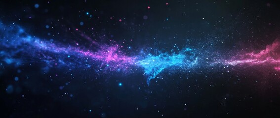 Fototapeta premium Colorful powder explosion creates a vibrant cosmic effect with blue and purple hues against a black background