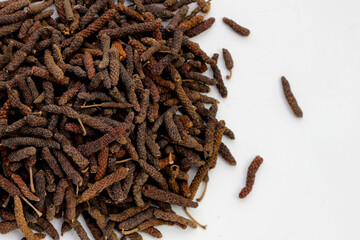 Dried long pepper or Indian long pepper