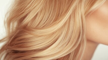 Fototapeta premium Soft, flowing blonde hair cascades elegantly, showcasing natural