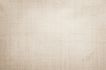 Fototapeta premium Brown sackcloth woven texture background in natural pattern. Jute hessian burlap, linen background in light beige cream color blank. Weaving canvas fiber line cotton cloth textured as organic.